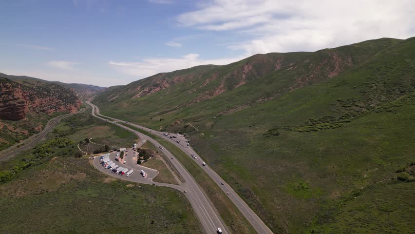 highway road and mountains in Montana aerial view