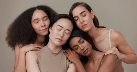 Diversity, beauty and women, portrait and cosmetics with wellness, dermatology and glow on studio background. Different skin, unique and inclusion with model group in a studio, skincare and face Video de stock