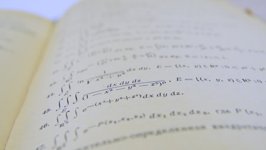 Mathematic formulas formulae equations on a paper integral. Mathematical equations tasks formulas printed on old paper camera slide. Studying. - Powered by Shutterstock - Get 15% off with code: PIKWIZARD15