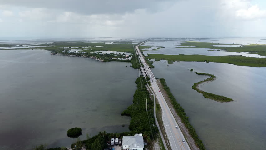 traffic in the lower Florida Keys near Sugarloaf Key drone shot Royalty-Free Stock Footage #1107888829