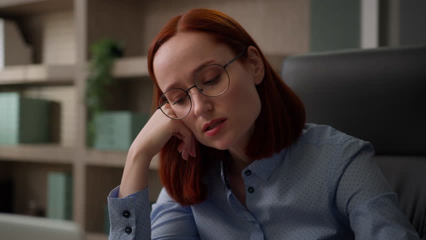 Tired fatigued Caucasian girl office woman business employer entrepreneur sad exhausted businesswoman bored with boring computer work lazy unmotivated uninterested laptop job tiredness at workplace Royalty-Free Stock Footage #1107892103