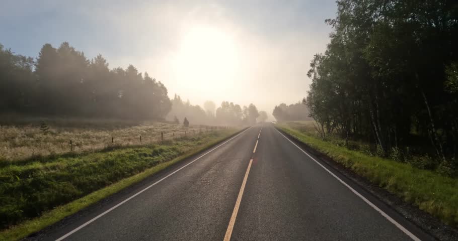 Fog on a Norway road. POV car trip. Vehicle point-of-view Driving a Car on a Road in Norway.