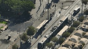 Jerusalem tram light rail train and city street aerial drone view, Jaffa street, Israel