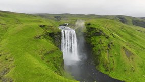 4K aerial video of Skogafoss waterfall. South Iceland. Epic Drone Shot Mountain Waterfall. Slow motion shot