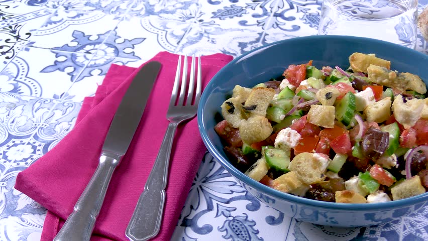 Greek salad tomatoes, cucumbers red onions and feta