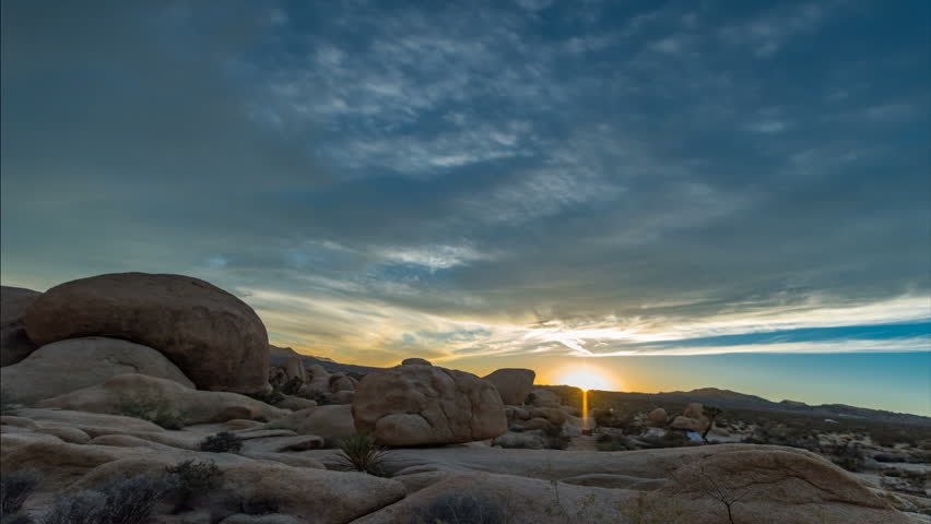 Sunset over the rocky terrain in California