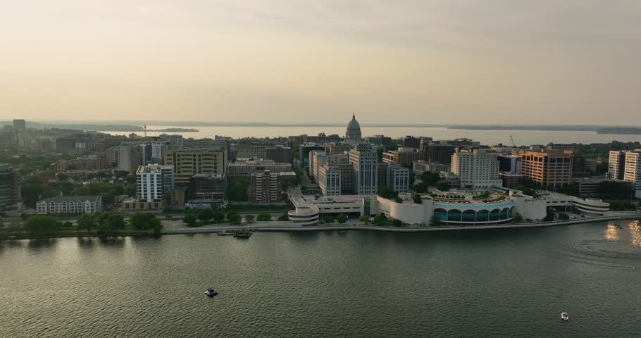 Aerial view of Madison city center located by two lakes at sunset, Wisconsin