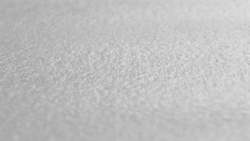 Protective foam packaging plastic material. White blank industrial background. Macro. Rotation | Shutterstock HD Video #1107927067
