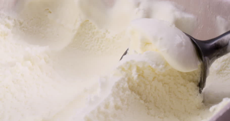 4K footage Front view, Scoop fresh coconut milk ice cream.