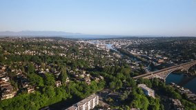 Aerial View Shot of Seattle, Washington USA, summer vibes, green trees, sun shining, Queen Anne, Fremont, Ballard, Wallingford, Crown Hill