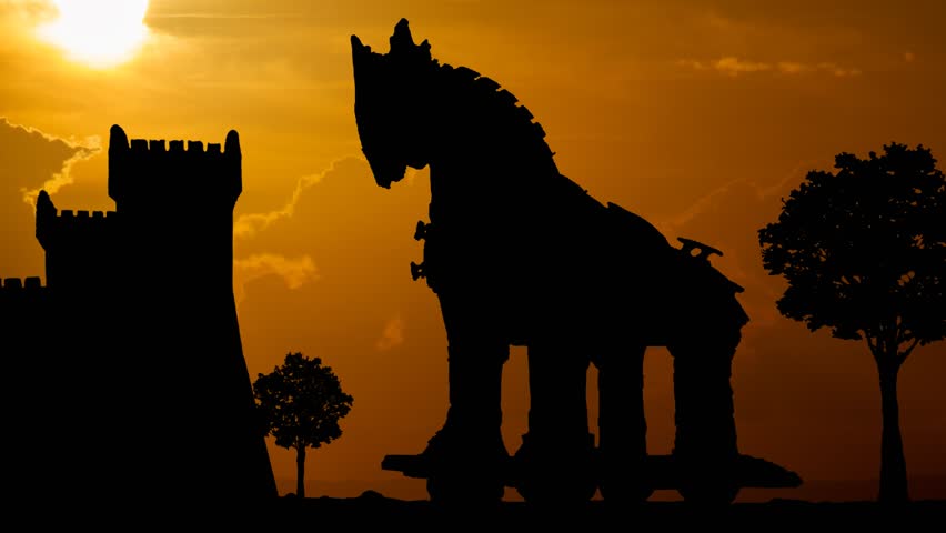 Mythological Trojan Horse in Silhouette at Sunset, Time Lapse with Red Sky and Fiery Sun Royalty-Free Stock Footage #1107953321