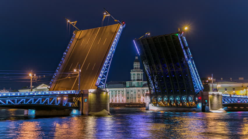 Raised Palace Bridge timelapse amid numerous boats and the prominent Kunstkamera - Museum of Anthropology and Ethnography. Overlooking the Neva River, scene embodies St. Petersburg's charm. Russia Royalty-Free Stock Footage #1107957575