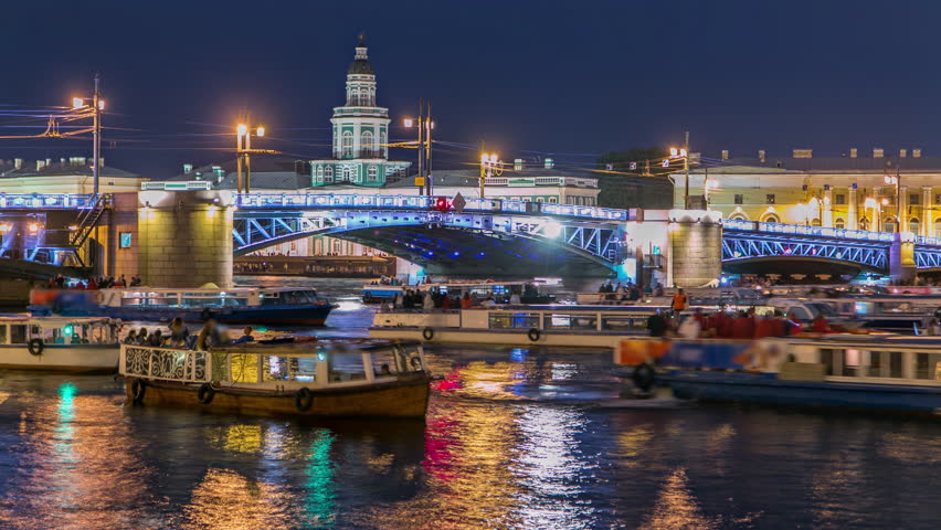 Raising of Palace Bridge timelapse amid numerous boats and the prominent Kunstkamera - Museum of Anthropology and Ethnography. Overlooking the Neva River, scene embodies St. Petersburg's charm. Russia Royalty-Free Stock Footage #1107957577