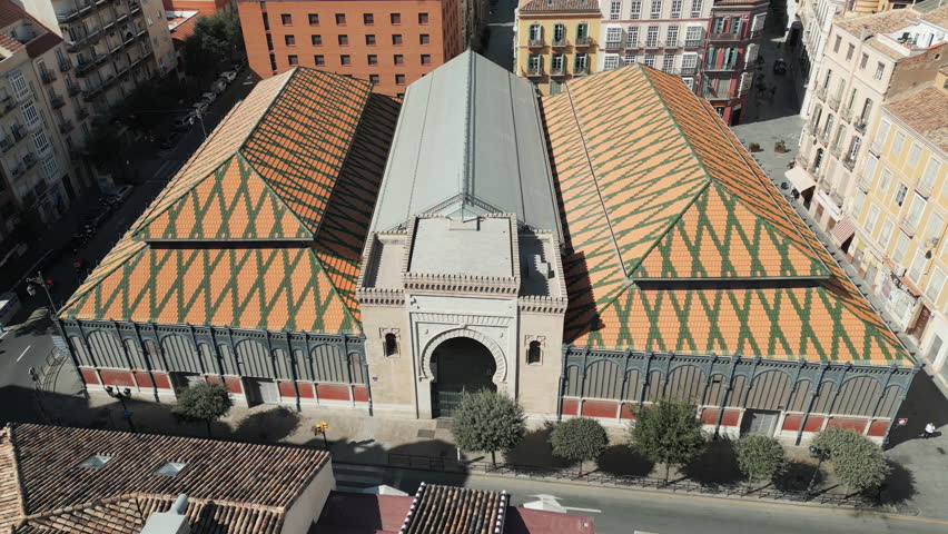 Captivating aerial video of Malaga Central Market, a picturesque building located in the heart of Malaga, Spain