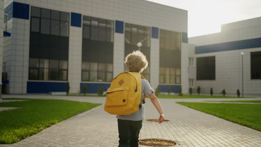 Caucasian Little Boy With School Backpack Running To School, Slow Motion, Following Back Shot Royalty-Free Stock Footage #1107960845