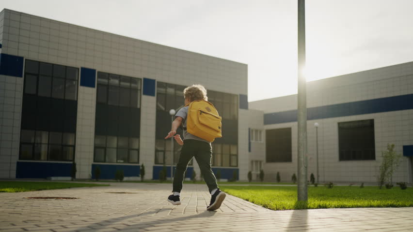 Child Boy Running To Modern Building Of School, Back View, Slow Motion, Happy Emotions, Go To School Royalty-Free Stock Footage #1107960847