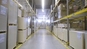 Cargo distribution warehouse aisle with cardboard boxes on shelves. Walking in industrial freight shipment storehouse with nobody indoors - Powered by Shutterstock - Get 15% off with code: PIKWIZARD15