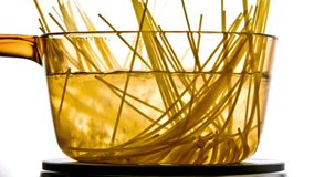 Boiling Elegance: 4K Close-Up of Cooking Spaghetti in Boiling Water
