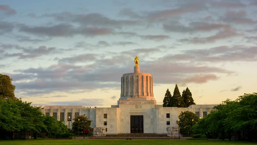Dawning Elegance: 4K Time-Lapse of Salem, Oregon's State Capitol Building with Cloudy Dawn Sky Royalty-Free Stock Footage #1107969309