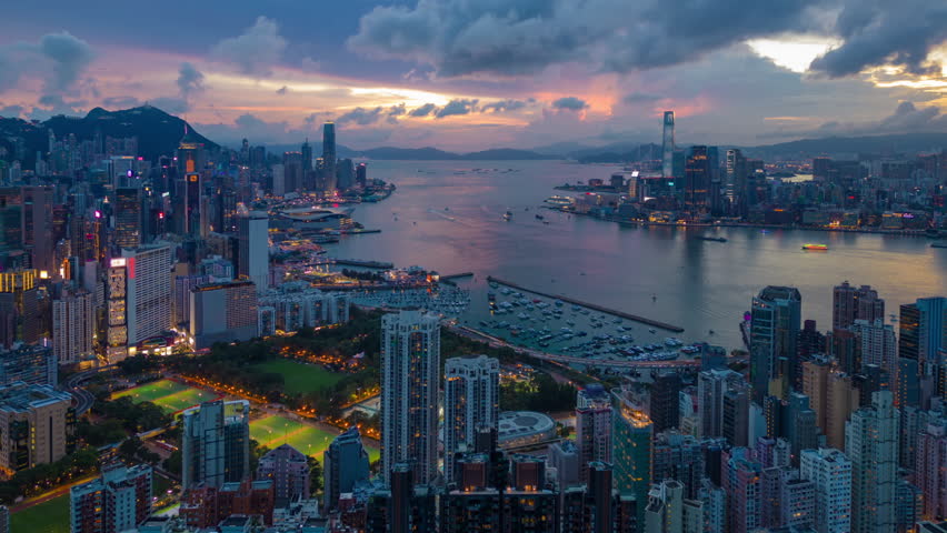 Aerial hyperlapse, dronelapse video of Hong Kong city at night Royalty-Free Stock Footage #1107969493