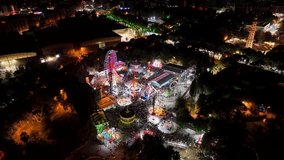 aerial view of people and toys having fun in amusement park - Powered by Shutterstock - Get 15% off with code: PIKWIZARD15
