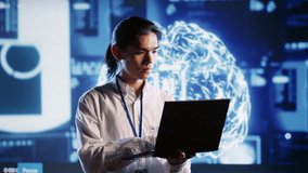 Portrait of smiling specialist using laptop to maintenance artificial intelligence neural networks made up of interconnected nodes. Happy computer operator updates AI system processing information - Powered by Shutterstock - Get 15% off with code: PIKWIZARD15