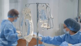 Elderly woman on operating table, attended by skilled surgeons. - Powered by Shutterstock - Get 15% off with code: PIKWIZARD15