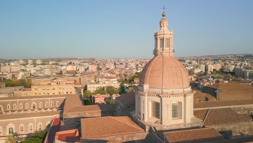 Discover Catania, Sicily from above with Monastero Benedettini in view. Aerial charm and history converge in this drone video. Royalty-Free Stock Footage #1107991217