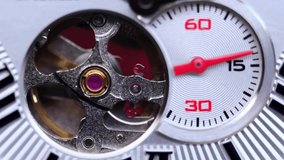 gear drive motion in skeleton watch. Mechanical watches with gears and cogs. Watch or clock mechanism. Clockwork details and parts. Inside watch, mechanical watch in macro view. Macro Shot Clock Face - Powered by Shutterstock - Get 15% off with code: PIKWIZARD15