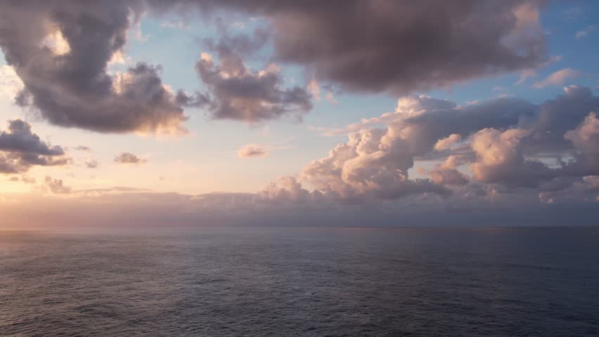 4k Aerial drone fly over open sea. Sunset over open sea