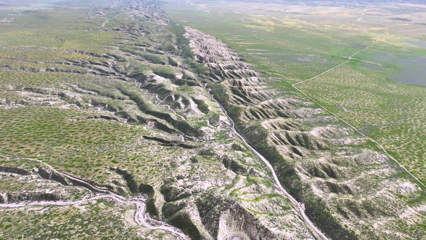Flying over the San Andreas earthquake fault outside of Los Angeles. Normally a desert, but green from recent rains.