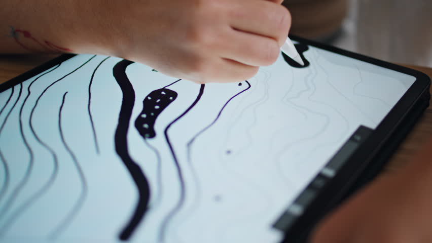 Designer hand sketching pad at remote workplace closeup. Creative artist fingers drawing digital pen on graphic tablet display in modern studio desk. Unknown woman enjoying art process at home studio Royalty-Free Stock Footage #1108001519