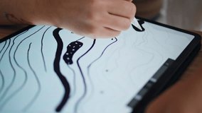 Designer hand sketching pad at remote workplace closeup. Creative artist fingers drawing digital pen on graphic tablet display in modern studio desk. Unknown woman enjoying art process at home studio - Powered by Shutterstock - Get 15% off with code: PIKWIZARD15