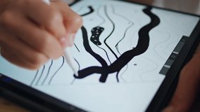 Designer hand sketching pad at remote workplace closeup. Creative artist fingers drawing digital pen on graphic tablet display in modern studio desk. Unknown woman enjoying art process at home studio - Powered by Shutterstock - Get 15% off with code: PIKWIZARD15