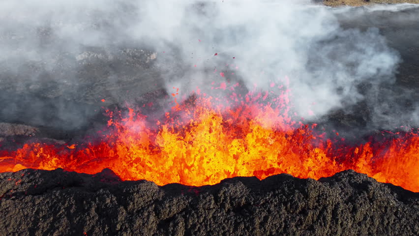 4K Drone aerial video of Iceland Volcanic eruption 2023. The volcano Litli-Hrutur is located in the valley Reykjanes close to Grindavik and Reykjavik. Hot lava and magma coming out of the crater. Royalty-Free Stock Footage #1108005345