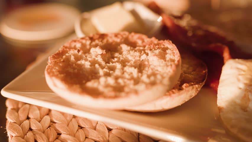 Freshly Toasted English Muffin: Close-Up, Breakfast Plate, Warm Lighting Royalty-Free Stock Footage #1108008853