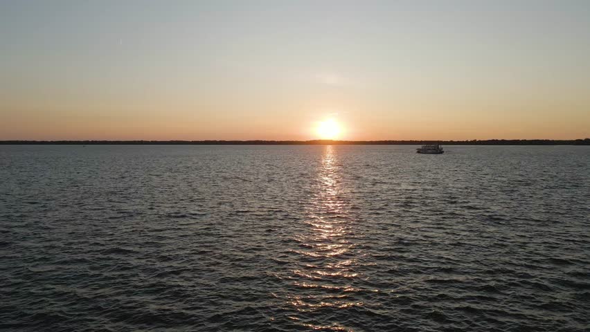 Lake Erie at Sunset in Erie Pennsylvania Ascending Over Water Revealing Horizon