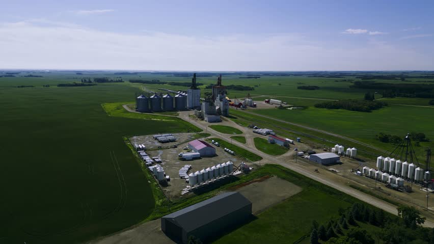A Large Farming Grain Elevator System on Land for an Agricultural Resource Food Supply Business in Killarney Manitoba Canada Royalty-Free Stock Footage #1108010995