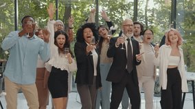 Cinematic footage of a business corporate party. Group of businessmen and businesswomen celebrating the annual company achievements - Powered by Shutterstock - Get 15% off with code: PIKWIZARD15