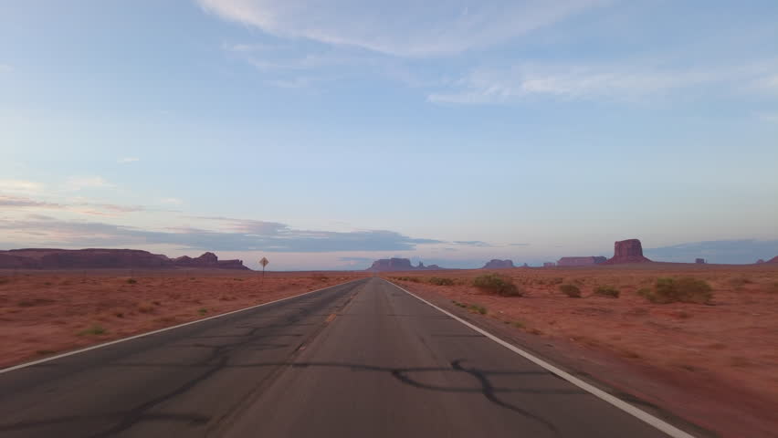 Driving Plate Monument Valley Scenic Drive Highway 163 Dusk Northbound Multicam Set 01 Front View Arizona Utah Southwest USA Royalty-Free Stock Footage #1108018349