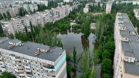 The flooded streets of the city of Kherson after the explosion of the dam of the Kakhovka reservoir. Ecological catastrophe in Ukraine. Russian-Ukrainian war. Exclusive drone footage
