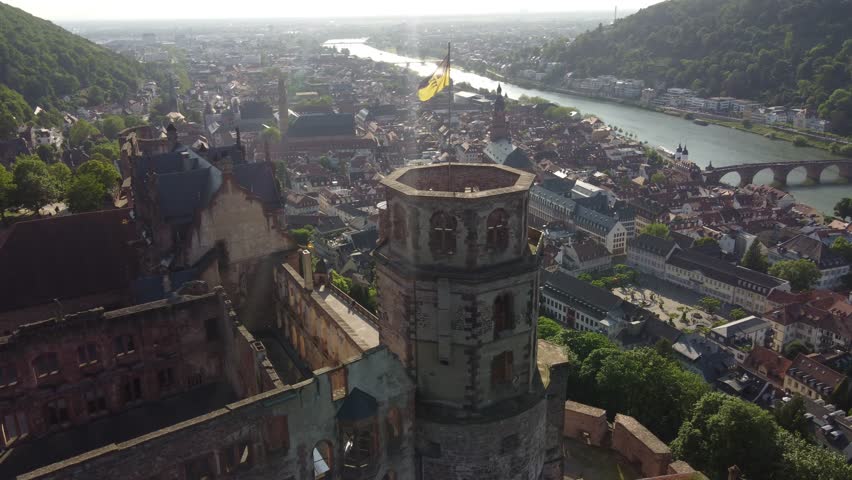 Drone descend pan across stunning city and heidelberg castle palace Royalty-Free Stock Footage #1108021003