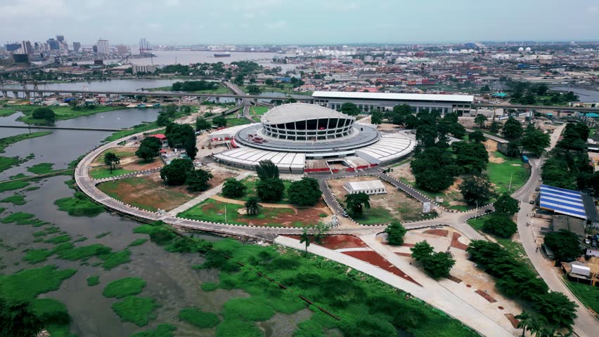 The drone is flying up and around the National Theatre Nigeria in Lagos Nigeria Aerial Footage 4K
