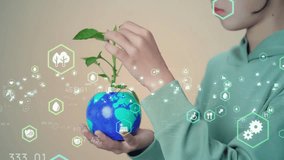 Girl holding a planet earth with plant and environment technology concept. Sustainable development goals. SDGs. - Powered by Shutterstock - Get 15% off with code: PIKWIZARD15