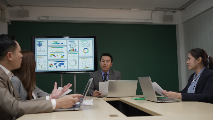 Employees are meeting at office. White collar worker concept. Panning right direction. Royalty-Free Stock Footage #1108023953