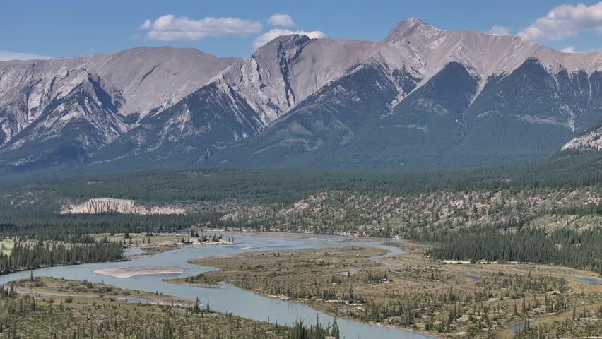 Left to right drone view of the North Saskatchewan River as it cuts through the Kootenay Plains Ecological Reserve, Alberta, Canada