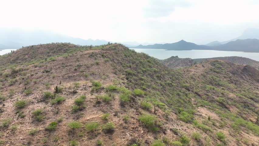 Aerial view of water dam and reservoir lake aerial drone footage.