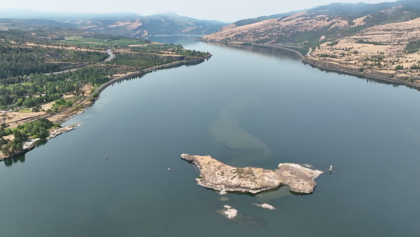 The Columbia River Gorge is a federally protected scenic area forming the boundary between Washington and Oregon. The scenic area is a popular area for hiking, biking, fishing, and water sports.
