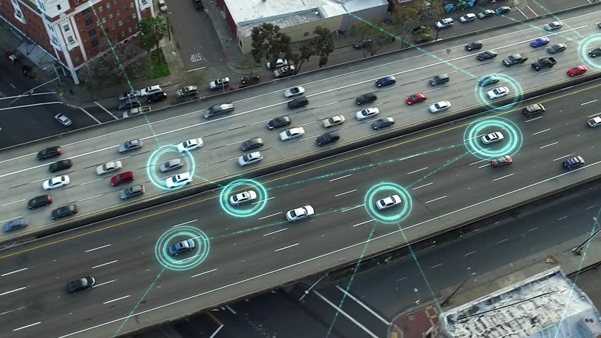 Aerial View of Highway Full of Traffic, Autonomous Vehicles Connected to Futuristic Network. Driverless Cars with Holographic HUD Elements. Intelligent Traffic Detection System. Smart Transportation. Royalty-Free Stock Footage #1108045649