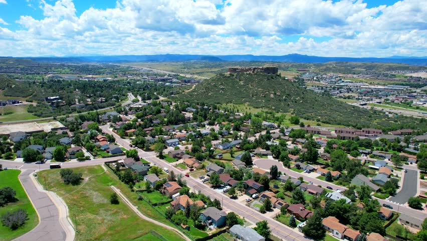 Aerial Drone Pan over neighborhood in the town of castle rock Colorado, a suburb of Denver Royalty-Free Stock Footage #1108047081